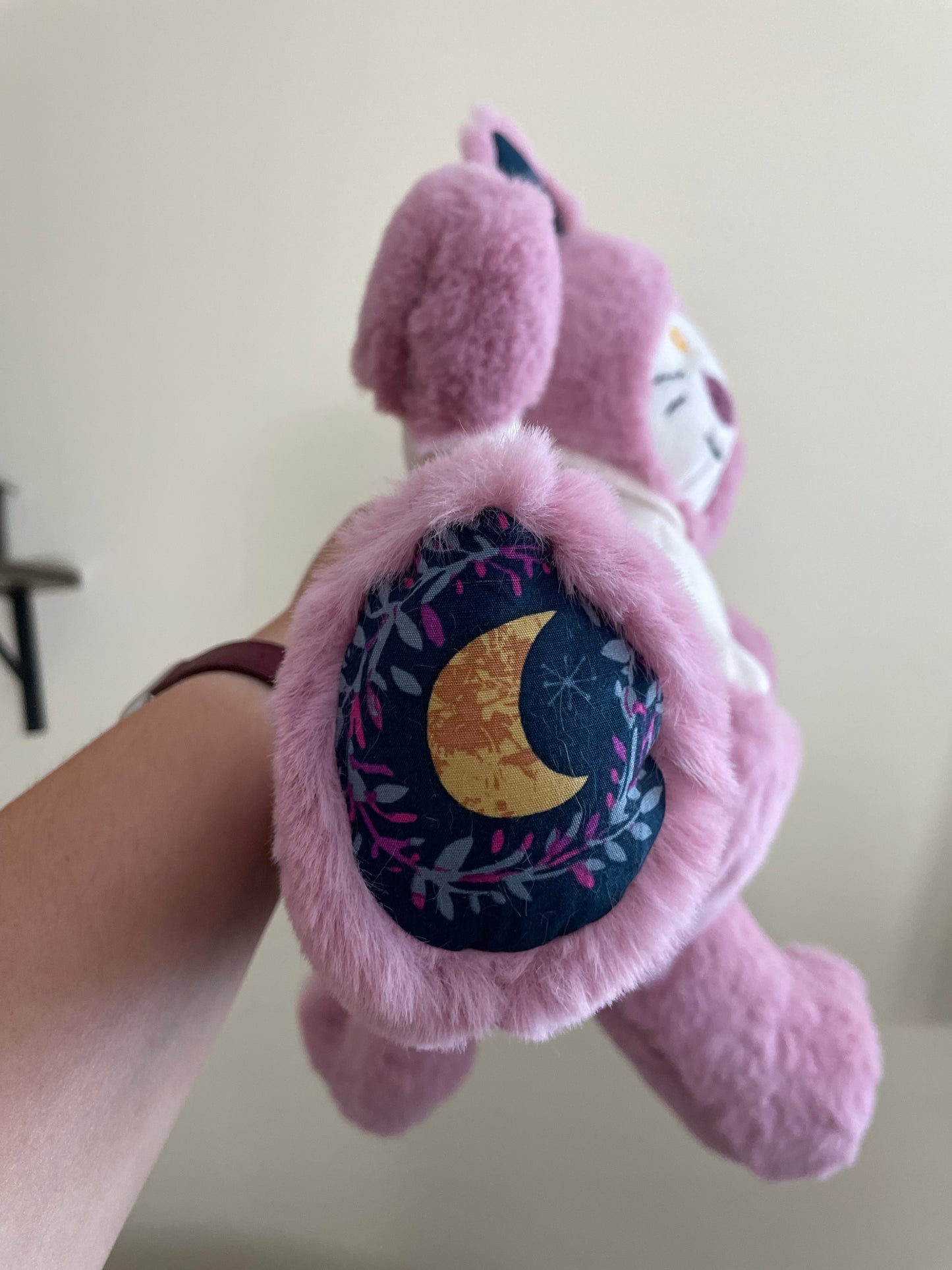 Pink Cat in an Ivory Knit Sweater