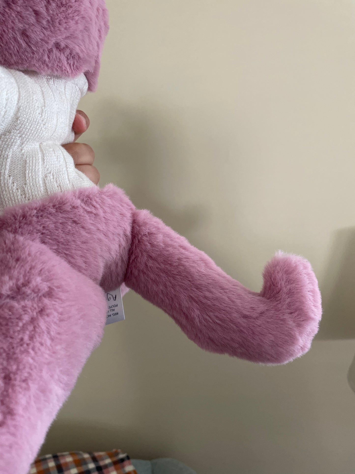 Pink Cat in an Ivory Knit Sweater